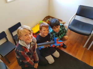 Aari, Jaer and Nikau gifted this wooden toy truck to West Coast Health so that children could play while they wait.